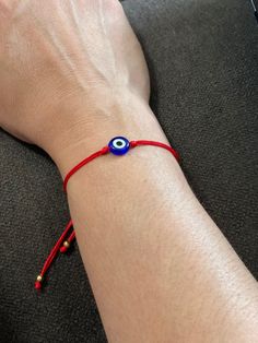 "Red string bracelets made of durable nylon cord, resin evil eye. Nickel free, lead free, no other harmful chemical composition lightweight and waterproof.  Adjustable, The max length is 10\", Adjust woven rope allows to create the perfect size for any wrist. Suitable size for Unisex Adult, Teens, Little girls, boys. This cute bracelet will be your amulet, the red strings are used for protection and luck and the evil eye works as a powerful negative energy drifter." Trendy Resizable Jewelry With Nylon Cord, Adjustable Red Evil Eye Friendship Bracelets, Red Evil Eye Friendship Bracelet, Red Evil Eye Bracelet With Adjustable Cord, Casual Adjustable Evil Eye Bracelet As Gift, Casual Evil Eye Friendship Bracelets As Gift, Casual Evil Eye Friendship Bracelets For Gifts, Trendy Adjustable Evil Eye Bracelet, Adjustable Casual Evil Eye Jewelry