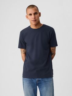 Soft cotton jersey T-shirt.  Crewneck.  Short sleeves.  Standard fit.  Slim through the chest and shoulders.  Hits at the hip.  Colin in black, blue) is 6'2"/188cm with 32"/81cm waist and 32"/81cm inseam wearing regular Gap Gap Everyday Crew Neck T-shirt, Gap Casual Relaxed Fit T-shirt, Blue Crew Neck Muscle Tee For Summer, Gap Summer Streetwear T-shirt, Gap Tops For Summer Streetwear, Navy Relaxed Fit Short Sleeve T-shirt, Navy Cotton T-shirt For Everyday, Casual Jersey Shirt With Crew Neck, Casual Crew Neck Jersey Shirt