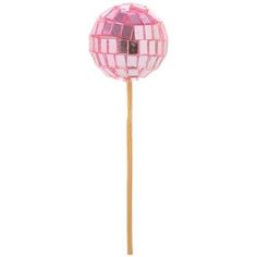 a pink disco ball lollipop on a wooden stick with a white back ground