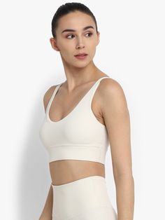 Ivory Inspire Sports Bra Beige Sporty Activewear With Built-in Bra, White Sports Bra With Built-in Bra And Wide Straps, Beige Sports Bra With Built-in Bra, White Yoga Sports Bra With Built-in Padding, White Compressive Bra With Light Support, Supportive Seamless White Sports Bra, Beige Sporty Sports Bra, Sporty Beige Sports Bra, White Seamless Sports Bra For Light Exercise