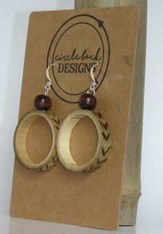 the earrings are made from wood and have brown beads