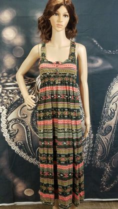 This is a women's sleeveless racerback tank pullover maxi dress. It has an elastic empire waistband, scoop neck with 6 buttons at the front, and multi color tribal print throughout. The measurements lying flat are: Chest 14, waist 11 (expandable), shoulder to shoulder 11, and length from top of the shoulder to hem is 49". This is super cute and comfy! Please contact me with any questions. Hurley Clothing Women, Sleeveless Tank, Racerback Tank, Scoop Neck, Multi Color, Super Cute, Womens Sizes, Maxi Dress, Elastic