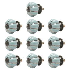 twelve blue knobs with gold accents are shown in this set on a white background