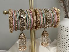 pearl kundan   bangles set for both hands. Pink Bollywood Bangle For Festivals, Pink Meenakari Bracelets For Festivals, Pink Meenakari Bangle For Wedding, Bollywood Style Pink Bangle For Diwali, Pink Meenakari Wedding Bangle, Pink Meenakari Bangle For Festivals, Festive Pink Meenakari Bangle, Bangles Set Indian, Punjabi Bangles