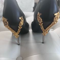 Versace Virtus Pumps, Worn Inside House, Never Worn Out. Luxury Heels With Metallic Accents For Formal Occasions, Elegant Formal Heels With Metallic Accents, Luxury High Heels With Metallic Accents, Versace Chunky Heels, Versace Stilettos, Versace Gold Medusa Heels, Versace Black Platform Heels, Black And Gold Versace Shoes, Shoes Women Heels