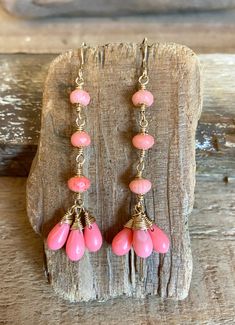 Gold filled dangle earrings with coral gemstones Coral Jewelry Gift With Ear Wire, Coral Jewelry With Ear Wire For Gift, Gift Coral Jewelry With Matching Earrings, Coral Dangle Jewelry For Gifts, Pink Briolette Earrings With Natural Stones, Bohemian Coral Dangle Earrings, Pink Briolette Natural Stone Earrings, Pink Drop Earrings With Natural Stones, Wire Wrapped Long Drop Linear Earrings