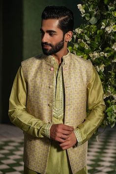 Sap green kurta with embroidered placket and cuffs. Paired with a churidar and mughal printed bundi. - Aza Fashions Pista Green Nehru Jacket For Designer Wear, Green Nehru Jacket With Resham Embroidery For Transitional Season, Traditional Green Nehru Jacket Straight Kurta Style, Green Nehru Jacket With Resham Embroidery For Diwali, Green Nehru Jacket With Resham Embroidery For Eid, Green Nehru Jacket With Zari Work, Diwali Green Nehru Jacket With Resham Embroidery, Traditional Green Nehru Jacket, Festive Pista Green Nehru Jacket For Designer Wear