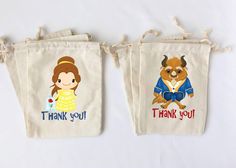 two bags with princess and beast characters on them, one has the words thank you