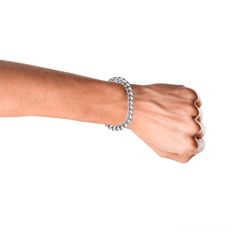 This Men's 10K White Gold Solid Cuban Link Bracelet from Luxurman is the perfect accessory for any man who wants to add a touch of sophistication to his look. This bracelet is crafted from 10K white gold, making it durable and long-lasting. The bracelet features a classic Cuban link design, with a box lock clasp for added security. The bracelet is solid, so it won't bend or break easily. The white gold color gives it a timeless look that will never go out of style.

This bracelet is perfect for Classic White Gold Cuban Link Sterling Silver Bracelet, Classic Silver Cuban Link Bracelet With Stainless Steel Clasp, Classic Round Cuban Link Bracelet, Tarnish Resistant, Polished White Gold Cuban Link Bracelet, Classic Round Cuban Link Bracelet Tarnish Resistant, Classic Round Cuban Link Tarnish Resistant Bracelet, Elegant Sterling Silver Cuban Link Bracelet With Polished Finish, Classic White Gold Diamond Bracelet With Oyster Clasp, Classic White Gold Diamond Oyster Bracelet