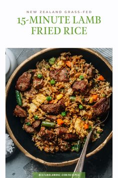 a bowl filled with rice and meat on top of a table