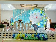 an elephant themed birthday party with balloons and decorations