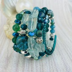 Turquoise Blue Bead Jasper Swarovski Crystal 6 Stack Wrap Bracelet Silver Tone Turquoise Bohemian Crystal Bracelet, Adjustable Beaded Aquamarine Bracelets, Beaded Aquamarine Bracelets, Blue Bohemian Beaded Bracelets With Faceted Beads, Bohemian Blue Beaded Bracelets With Faceted Beads, Blue Beaded Crystal Bangle Bracelet, Bohemian Turquoise Crystal Bracelet With Colorful Beads, Turquoise Bohemian Crystal Bracelet With Colorful Beads, Blue Bohemian Crystal Bracelet With Round Beads