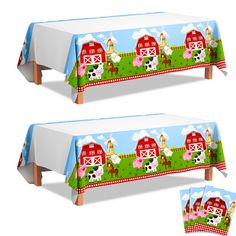 two tables with farm animals on them, one has a blue tablecloth and the other has a red barn