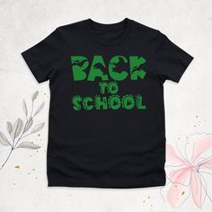 "Boys Back to School Shirt, Dinosaur Shirt, Boys Kinder Shirt, Kids School Shirt, Kindergarten Shirt, Dino Preschool Shirts, Student T-Shirt  Hello, Thanks for your support. Your gladness comes first and all work is done with Love in here. Always keep your support, please:) Boys Back to School Shirts are branded Bella+Canvas.  Boys Back to School Shirt  Contents: - Solid colors: %100 Cotton.  - Heather colors: %52 Cotton + %48 Polyester* This ultra-soft graphic tee is made from a comfortable cotton-poly blend that is breathable, non-shrinking, and lasts longer than your average graphic shirt. HOW TO ORDER YOUR BOYS BACK TO SCHOOL SHIRT  -Please, Check and Review all  Boys Back to School Shirt Photos. -Select Your Boys Back to School Shirt T-Shirt Size and Boys Back to School Shirt T-Shirt Black T-shirt For Back To School, Funny T-shirt For End Of School Year, Black T-shirt For Back To School Events, Funny T-shirt For School, Black Graphic Shirt For School Events, Black Graphic Print Shirt For School Events, Green School Spirit Tops For School, Casual Black Tops For School Events, Black Casual Tops For School Events