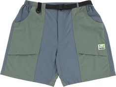 Go on your next adventure in the Tactics Cascadia Cargo Shorts. Built from upcycled fabrics, these mid-length shorts feature a standard fit, front hand pockets, rear right zip pocket, dual cargo pockets with velcro closure and built in stretchy webbing belt. Functional Green Cargo Shorts, Green Functional Cargo Shorts, Green Functional Shorts With Cargo Pockets, Outdoor Shorts With Patch Pockets, Shorts With Patch Pockets For Outdoor Activities, Cargo Shorts With Pockets For Camping, Short Shorts With Patch Pockets For Outdoor Activities, Short Cargo Shorts With Pockets For Camping, Green Cargo Shorts With Functional Pockets