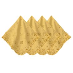 four yellow napkins with ruffled edges are shown in front of a white background