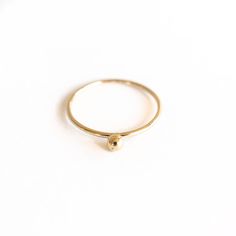 A dainty, but sturdy Single Dot Gold Ring to be worn often and treasured. • Smooth finish • Made-to-order, please allow 3-5 business days for preparation Material: 14k Gold Filled Everyday Tiny 14k Gold Rings, 14k Gold Midi Rings For Everyday, Tiny 14k Gold Round Midi Rings, Tiny 14k Gold Filled Yellow Gold Ring, 14k Gold-filled Yellow Gold Ring, 14k Gold Dainty Midi Rings, Tiny Midi Rings In 14k Yellow Gold, Simple 14k Gold Midi Rings, Tiny Round 14k Gold Jewelry