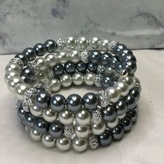 Lt Gray & Gray Pearl Glass Bead (8mm) Silver Resin Rondelle (4x8mm) Memory Wire Silver Plated Memory Wire Bead Ends Fits Up To 6 1/2 To 8 Inch Wrist The Bigger The Wrist The Less Layer Elegant Gray Beaded Bracelets, Elegant Gray Beaded Bracelets With Silver Beads, Elegant Silver Beaded Bracelets With Bling, Silver Beaded Bracelets With Bling, Silver Bling Beaded Bracelets, Easy Bracelets, Black Metal Bracelet, Jewelry Classy, Memory Wire Jewelry