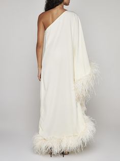 Taller Marmo's Ubud ivory viscose and acetate blend one-shoulder long dress featuring tone-on-tone decorative feathers at the hem and along the wide sleeve and side zip fastening. Composition: 78% acetate 22% viscose One-shoulder Cocktail Dress With Feathers, One-shoulder Feathered Cocktail Dress, One Shoulder Cocktail Dress With Feathers, One Shoulder Feather Cocktail Dress, One-shoulder Dress With Feather Trim, One-shoulder Feather Trim Dress, One-shoulder Feather Dress For Evening, One-shoulder Feathered Evening Dress, One Shoulder Dress With Feather Trim