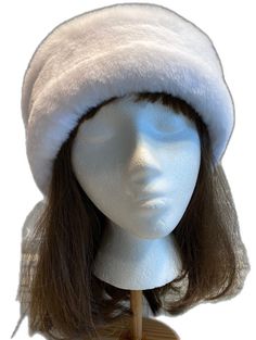 White Flat Brim Winter Hat, White Soft Winter Hat, White Faux Fur Winter Hat, Soft Adjustable White Bonnet, Fluffy White Winter Hat, Adjustable Soft White Bonnet, White Hat With Faux Fur Lining For Winter, White Winter Hat With Faux Fur Lining, White Winter Cloche Hat