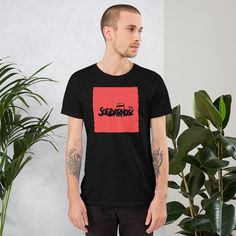 This Solidarnosc Unisex Premium T-Shirt feels soft and light with just the right amount of stretch. It's comfortable and flattering for both men and women.  + Solid colors are 100% combed and ring-spun cotton + Ash color is 99% combed and ring-spun cotton, 1% polyester + Heather colors are 52% combed and ring-spun cotton, 48% polyester + Athletic and Black Heather are 90% combed and ring-spun cotton, 10% polyester + Heather Prism colors are 99% combed and ring-spun cotton, 1% polyester + Pre-shrunk fabric NOTE: If you want a Men's or Women's t-shirt instead, please let us know by sending us a message after placing your order. Red Short Sleeve T-shirt For Gift, Unisex Black T-shirt For Gift, Casual Red T-shirt For Gift, Fitted Crew Neck T-shirt As A Gift, Black Relaxed Fit T-shirt As Gift, Black Relaxed Fit Shirt As Gift, Black Fitted Top For Gift, Black Fitted Top As A Gift, Red Short Sleeve T-shirt For Gifting