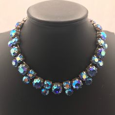 ON SALE Nice unsigned regency blue aurora borealis 1950s necklace in very good vintage condition. Measures 15 inches long. Very pretty collectible piece. Round Costume Jewelry Necklaces For Party, Party Jeweled Rhinestone Necklace, Sparkling Crystal Costume Jewelry Necklace, Crystal Rhinestone Costume Jewelry Necklace, Crystal Costume Jewelry Necklace With Sparkling Stones, Costume Crystal Necklace With Sparkling Stones, Party Rhinestone Jeweled Necklace, Costume Crystal Necklaces With Sparkling Stones, Party Costume Jewelry Crystal Necklaces