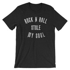 "Rock n Roll Stole My Soul shirt - Awesome gift for rocker - Distressed print style for old school rockers - Short-Sleeve Unisex T-Shirt This t-shirt is everything you've dreamed of and more. It feels soft and lightweight, with the right amount of stretch. It's comfortable and flattering for both men and women. * 100% combed and ring-spun cotton (heather colors contain polyester) * Fabric weight: 4.2 oz (142 g/m2) * Shoulder-to-shoulder taping * Side-seamed The Male model is wearing a size M. He Rocker T-shirt With Band Logo, Rock And Roll T-shirt With Text Print, Unisex Rock And Roll T-shirt For Streetwear, Rock And Roll Crew Neck T-shirt With Screen Print, Rock And Roll Screen Print Crew Neck T-shirt, Unisex Punk T-shirt With Letter Print, Unisex Rocker T-shirt For Concerts, Rock And Roll Short Sleeve Letter Print T-shirt, Rock And Roll Band Logo T-shirt For Streetwear