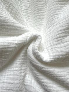 an image of white fabric textured on top of each other