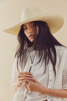 Make a statement in this so cool woven straw hat featured in an oversized, round brim design that easily folds up and packs away for traveling. * Dipped crown * Adjustable rope under chin | Arizona Packable Wide Brim Hat by Free People in White Women’s Straw Hat, Womens Wide Brim Hats, White Sun Hat, Random Reference, Straw Cowgirl Hat, Summer Headwear, Packable Sun Hat, Wide Brim Straw Hat, Summer Straw Hat