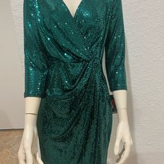 Adorable Green Sequin Knee Height Dress. Great For All Your Special Occasions. Wrap/Pull Over. Absolutely Stunning. Fitted Green Dress With 3/4 Length, Green 3/4 Sleeve Dress For Party, Fitted Sequin Dress With 3/4 Sleeves, Fitted Dress With Sequins And 3/4 Sleeves, Green 3/4 Sleeve Party Dress, Green Fitted Dress With 3/4 Sleeves, Brown Bodycon Dress, John Meyer, Green Sequin Dress