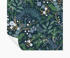 a wallpaper with blue and green florals on the side, along with white flowers