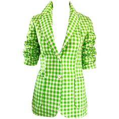 Make a statement in this chic never worn 1970s LARRY LEVINE cotton blazer jacket! Features lime green and white gingham print. Wonderful fitted tailored cut looks fantastic on! Two white buttons up the front, and two pockets at each side of the waist. Back center vent. Fully lined. Can easily be dressed up or down. Great with a tank and jean shorts, yet effortlessly chic with white pants. In great unworn condition. Made in USA Approximately Size Medium Measurements: 36 inch bust 30 inch waist 28 Spring Fitted Plaid Blazer, Fitted Plaid Blazer For Spring, Spring Gingham Blazer With Long Sleeves, Retro Spring Blazer For Office, Spring Gingham Blazer For Workwear, Retro Green Blazer For Spring, Spring Cotton Retro Blazer, 70s Blazer, Green Satin Top