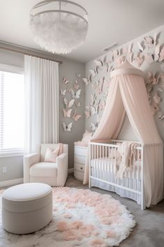 a baby's room with pink and white decor