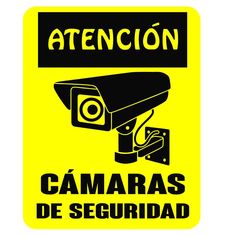 a yellow sign with the words attencion camaras de seguridad