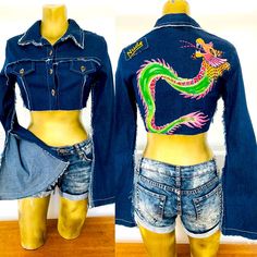 Rare, New-With-Tags, Vintage 2000’s, Deconstructed Jean Jacket By Nude Designs Los Angeles Size Medium. 97% Cotton, 3% Spandex And Is Hand-Washable. From The Famous Nude Boutique On Melrose Avenue In Los Angeles. Stretch Denim With Fabulous Hand-Painted Sequin Dragon And Logo At Back. Logo Button Closure At Front, Split Bell Sleeves. Approximate Unstretched Measurements When Fastened Are 32” At Bust, 13” In Length, 29” At Waist, 26” Sleeve Length, 16” Shoulder-To-Shoulder, 14” Around Sleeve Cuff Fitted Denim Cropped Jacket For Streetwear, Fitted Casual Cropped Jacket For Streetwear, Casual Fitted Cropped Jacket For Streetwear, Y2k Fitted Long Sleeve Outerwear, Y2k Blue Outerwear For Fall, Fitted Blue Cropped Winter Jacket, Blue Long Sleeve Cropped Jacket For Streetwear, Spring Fitted Streetwear Outerwear, Y2k Fitted Fall Outerwear