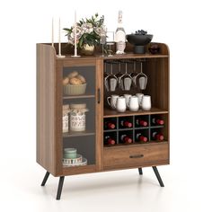 a wooden cabinet filled with lots of bottles and glasses