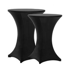 two black tables sitting next to each other