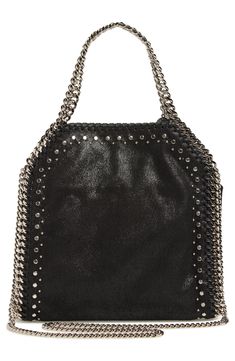 Distinctive diamond-cut chains beautifully complement the shimmering faux-leather exterior of this slouchy bag that's traced in mixed-scale studs. The chic, compact bag boasts a just-right interior lined in a lovely rose-hued logo jacquard. Magnetic-snap closure Top carry handles; chain strap Interior wall pocket Logo-jacquard lining Synthetic Made in Italy Designer Handbags Slouchy Bag, Compact Bag, Pocket Logo, Fabric Gift Bags, Interior Wall, Fabric Gifts, Anniversary Sale, The Chic, Print Gifts