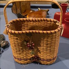 a wicker basket sitting on top of a blue table