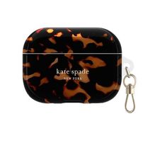 an animal print case with a keychain attached to the front and side of it