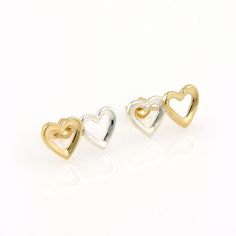 Tiffany & Co. 18K Yellow Gold & Sterling Silver Double Heart Designer Earrings These authentic Tiffany & Co. earrings are finely crafted from 18k yellow gold and sterling silver. They feature a beautiful double heart design which looks absolutely gorgeous on the ear. The earring backs are not Tiffany, but they are 18k yellow gold. They are fully signed with T&Co and the gold content.  Material:  18k yellow gold and sterling silver. Measurements: They are 16mm long, 8mm wide, and 1mm high. Weight: 1.7 grams Stock#: 26061     Powered by eBay Turbo Lister The free listing tool. List your items fast and easy and manage your active items. Track Page Views With Auctiva's FREE Counter Tiffany Co Earrings, Hearts Earrings, Double Heart, Fine Jewellery Earrings, Earring Backs, Heart Earrings, Heart Design, Designer Earrings, Tiffany & Co.