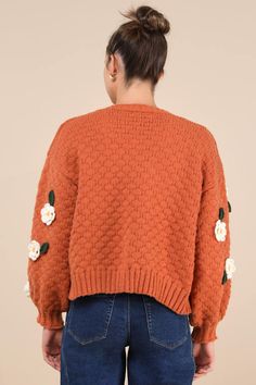 We know that the Lulus Chosen Charm Rust Orange Knit Embroidered Cardigan Sweater will always be your first pick when it comes to showing off your style! Cozy, heavy-gauge knit shapes this eye-catching cardigan sweater that features three-dimensional, crocheted floral embroidery throughout. Long balloon sleeves (with drop shoulders and fitted cuffs) frame a wide-cut, open-front bodice. Ribbed knit accents the neckline, cuffs, and hem. Fit: This garment fits true to size. Length: Size medium meas Orange Knit, Embroidered Cardigan, Long Balloons, Rust Orange, Balloon Sleeves, Floral Embroidery, Ladies Tops Fashion, Cardigan Sweater, Three Dimensional