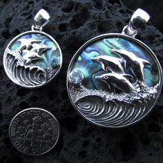 Wave Dolphin Necklace Pendant Small 20mm Large 30mm International customers please keep in mind that you might need to pay customs fee upon receiving item depending on your country regulations. Gift velvet drawstring pouch baggie included with each order. To better understand the size of item please look thru images, each of listings contains item next to a dime coin, which is 0.7 inch in diameter. Pieces with Abalone (Paua) Shells have unique patterns and colors. Every single one is unique. Col Ocean-inspired Sterling Silver Jewelry, Abalone Shell Inlay Jewelry For Gifts, Blue Round Pendant Jewelry, Dolphin Necklace Pendants, Fancy Envelopes, Hawaii Gift, Hawaii Jewelry, Dolphin Necklace, Wave Necklace