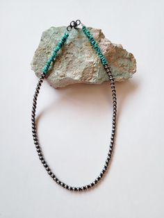 I made this awesome necklace with the Navajo Pearl beads and Kingman turquoise that is mined in Kingman Arizona. The Pearl's are sterling silver beads that have been oxidized and hand buffed. Each bead is hand strung onto a silver flex wire with a lobster claw closure. The necklace measures at 18 inches it looks great worn alone or layered with other necklace's. Please message me with any questions you may have. Artisan Turquoise Necklace With Silver Beads As Gift, Artisan Sterling Silver Turquoise Beaded Necklace, Silver Turquoise Necklace With Hand-strung Round Beads, Artisan Necklace With Oxidized Finish And Round Beads, Hand-strung Sterling Silver Turquoise Necklace, Adjustable Turquoise Necklace With Silver Beads, Beaded Turquoise Necklace With Sterling Silver Round Beads, Artisan Beaded Turquoise Necklace In Sterling Silver, Adjustable Hand-strung Turquoise Sterling Silver Necklace