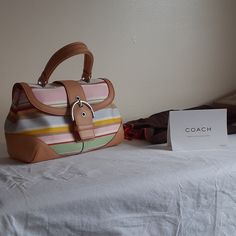 Coach Multi Stripe And Vachetta Leather Trim Multicolor Coach Pouch Bag, Multicolor Retro Coach Bag, Coach Multicolor Travel Satchel, Coach Multicolor Bag With Detachable Strap, Coach Multicolor Top Handle Satchel, Coach Multicolor Top Handle Shoulder Bag, Multicolor Coach Top Handle Satchel, Multicolor Coach Top Handle Shoulder Bag, Coach Multicolor Shoulder Bag With Detachable Handle