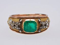 Vintage reproduction 18th century Georgian era rose cut diamond 2.00 ctw Emerald  925 Sterling prince Albert Ring ,For men Metal: Sterling Silver Metal Purity: 925 Metal Wt: 7.89 Grams Centre stone: Emerald  Stone type : Natural  Stone weight  : 2.00ctw. Side stone : Rose cut diamond  Stone  Type: Natural  Stone weight: 0.95 ctw Product Color: Oxidized Black and Gold Rhodium Plated on Sterling Silver Antique Engraved Emerald Ring For Formal Occasions, Victorian Emerald Ring With Rose Cut Diamonds, Victorian Rose Cut Diamond Ceremonial Rings, Victorian Gold Emerald Ring, Victorian Ceremonial Ring With Rose Cut Diamonds, Antique Emerald Ring With Rose Cut Diamonds For Anniversary, Formal Heirloom Emerald Ring With Single Cut Diamonds, Antique Engraved Emerald Anniversary Ring, Heirloom Style Formal Emerald Ring With Rose Cut Diamonds