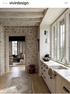 the kitchen is clean and ready to be used as a living room or dining area