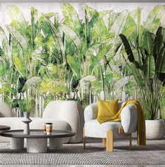 a living room filled with furniture next to a wall covered in green leaves and plants