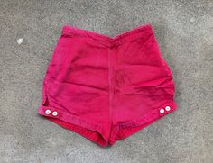 --  Vintage 50s to early 60s Bradley Red Cotton Side Zip High Waisted Shorts --  Nice condition with light wear, but look killer and have tons of life left --  100% cotton  --  Size 24 x 1 1/4 (Small), but please see below for measurements --  Thanks for looking and have a fantastic day! MEASUREMENTS Waist - 12 inches across; 24 inch waist (can also be worn with one button let out, measuring 25 inch waist) Hips - 16 1/2 inches across; 33 inch hips Rise - 13 1/4 inches Inseam - 1 1/4 inches Total 60s Shorts, 1950s Shorts, Levis Pants, Early 60s, Vintage Americana, Red High, Pants Jeans, Skorts, Vintage 1950s