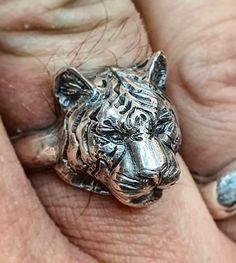 Sterling silver Tiger ring.Original design carved in wax then lost wax cast into solid sterling silver. Comes oxidised to bring out the stripes. Large piece which weighs 16.5g. Shown in a size P, and adjustable to ring sizes J-Z6. First class post included. Tiger Ring, Tiger Jewelry, Signature Rings, Man Ring, Forest Theme, Cat Ring, Special Delivery, Lost Wax, Ring Sizes